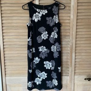 Black knee length dress with floral print